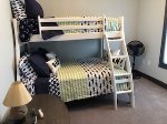 Guest bedroom with Twin over full bunkbed.....also single rollaway